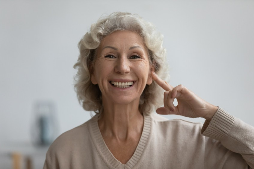 woman wearing Phonak ActiveVent hearing aids